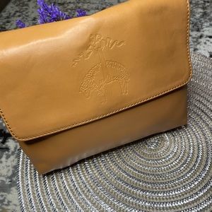 Caramel color clutch. Brooks brother. With fringe